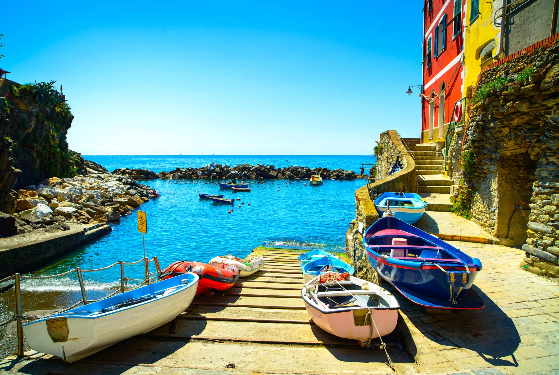 boats on a beach in cinque terre