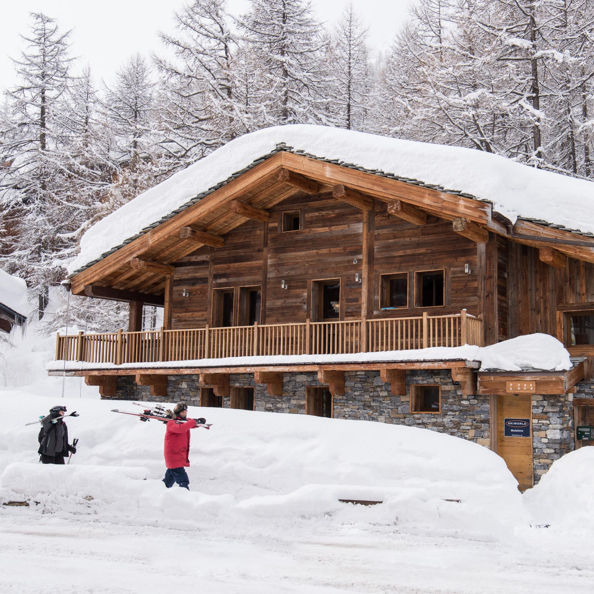 A charming, snow-covered luxury ski chalet in Val-d'Isère, France