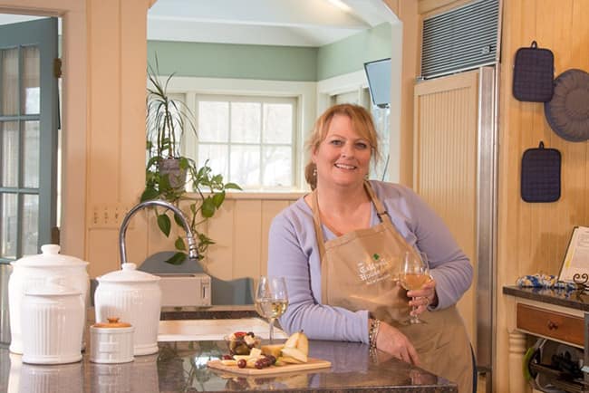photo of a b&b host in her kitchen