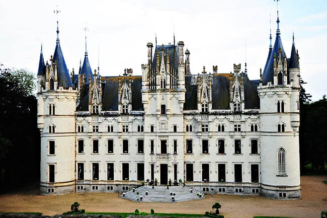 photo of a chateau in france with blue turrets